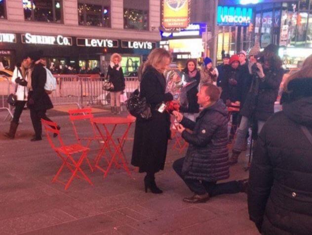 Brendan Rodgers proposing Charlotte Searle at the Times Square.